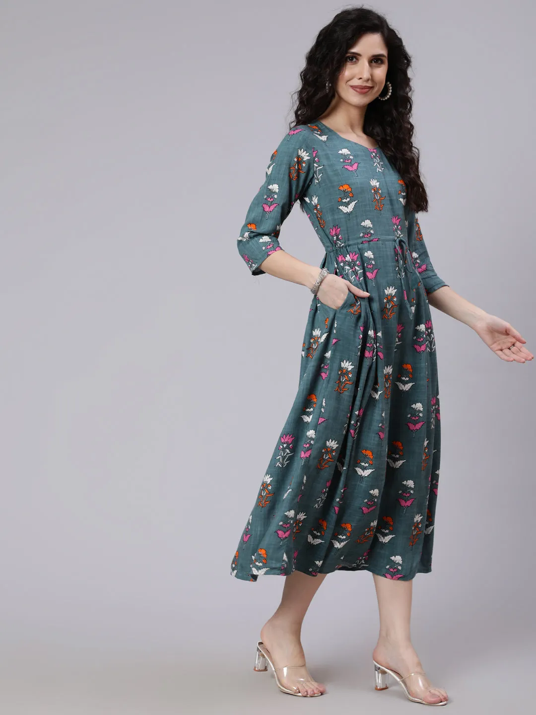 Women Green Floral Printed Flared Dress With Three Quarter Sleeeves