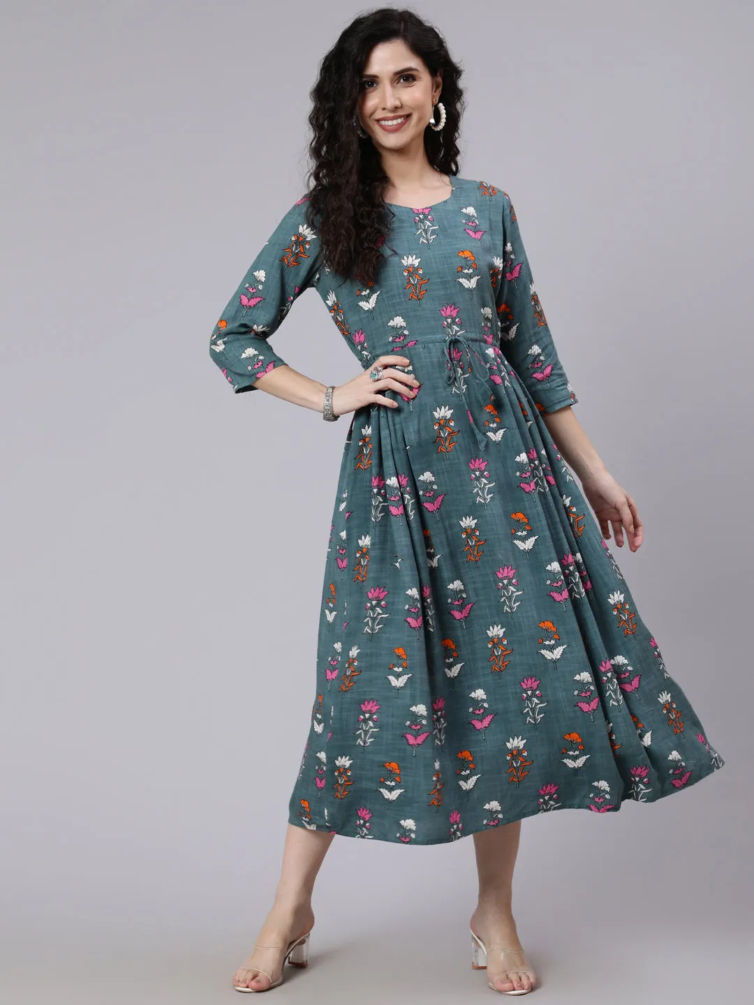 Women Green Floral Printed Flared Dress With Three Quarter Sleeeves