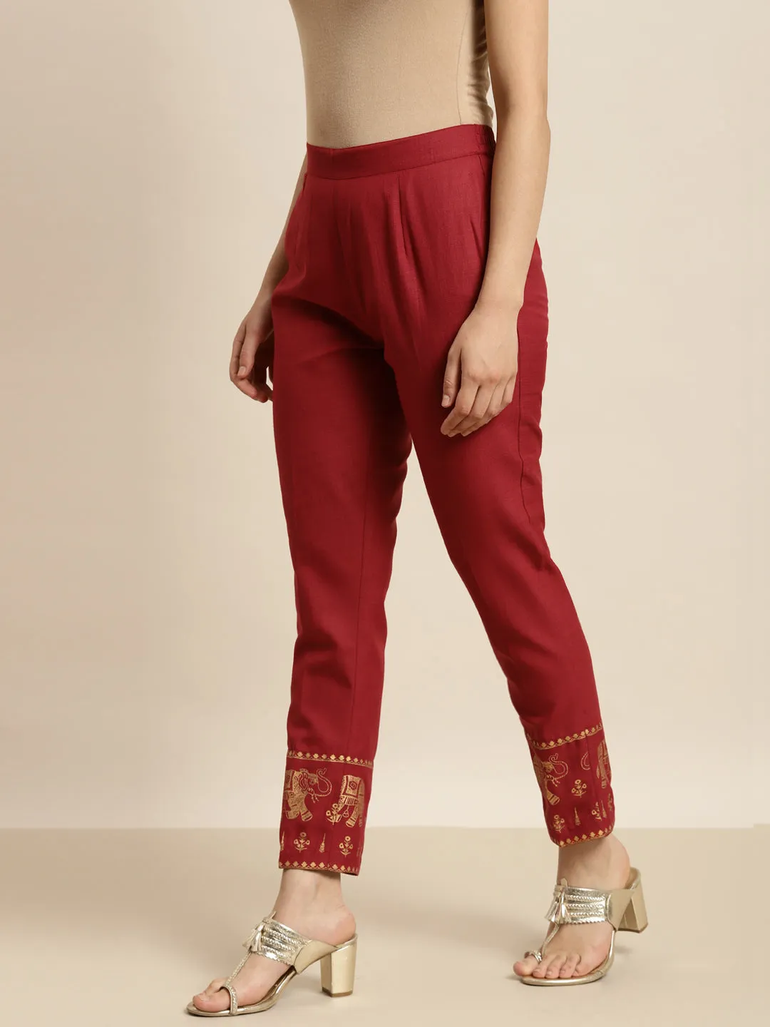 Women Maroon Elephant Border Foil Print Pencil Pants